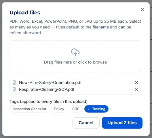 Upload files dialog with two queued PDFs and the Training tag selected
